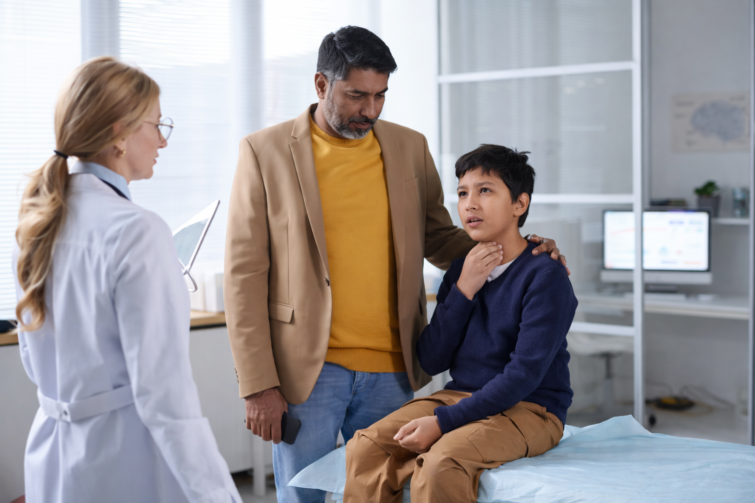 Parent caring for a child with cough and throat discomfort